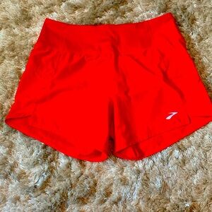 Brand new, never worn, no tags.  Medium Brooks chaser running shorts, 5 inch